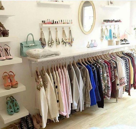 shelf and clothes underneath